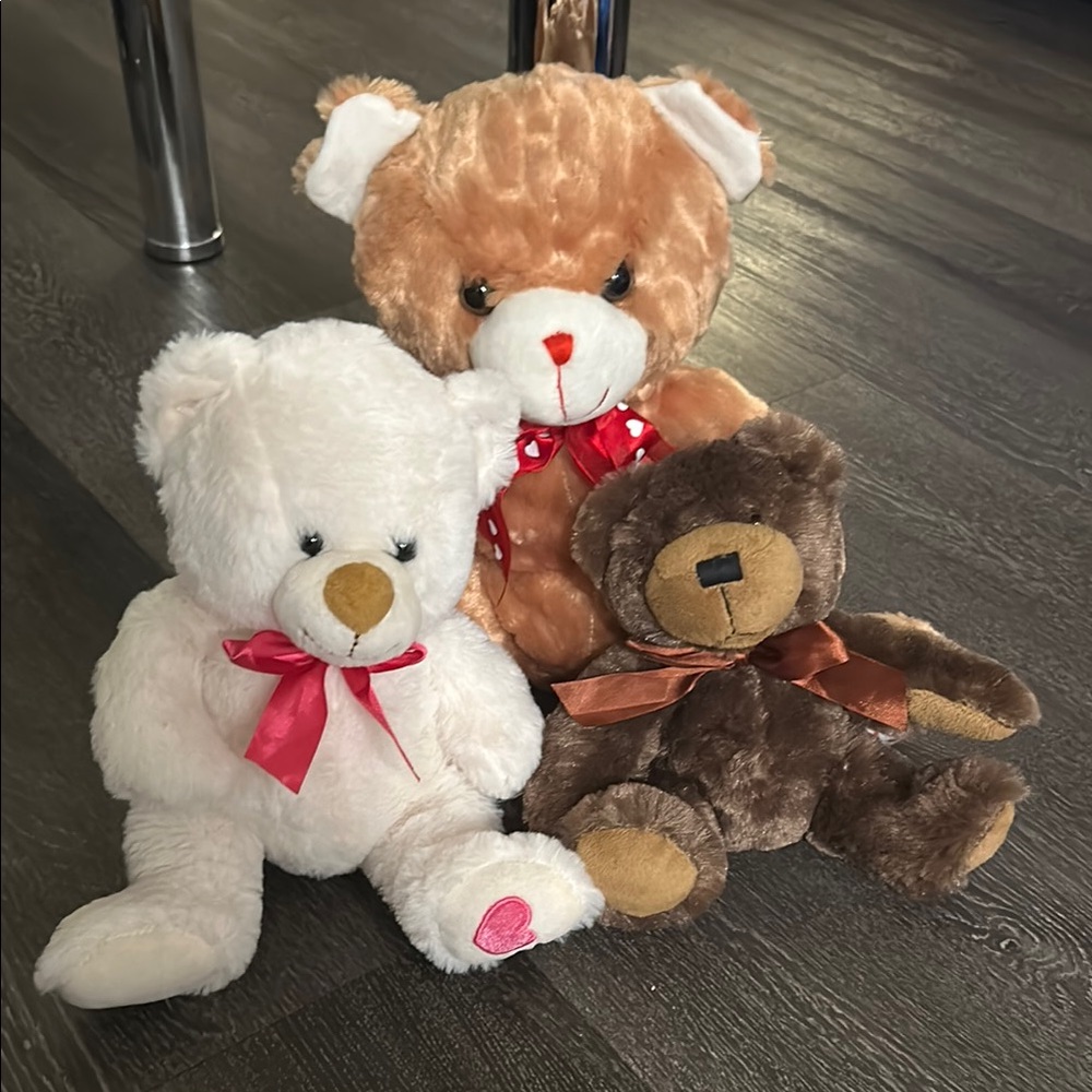 White and Brown Stuffed Animal Trio